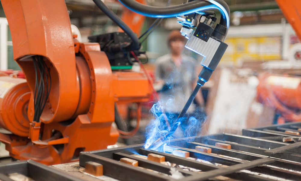 Welder robot operate in steel factory