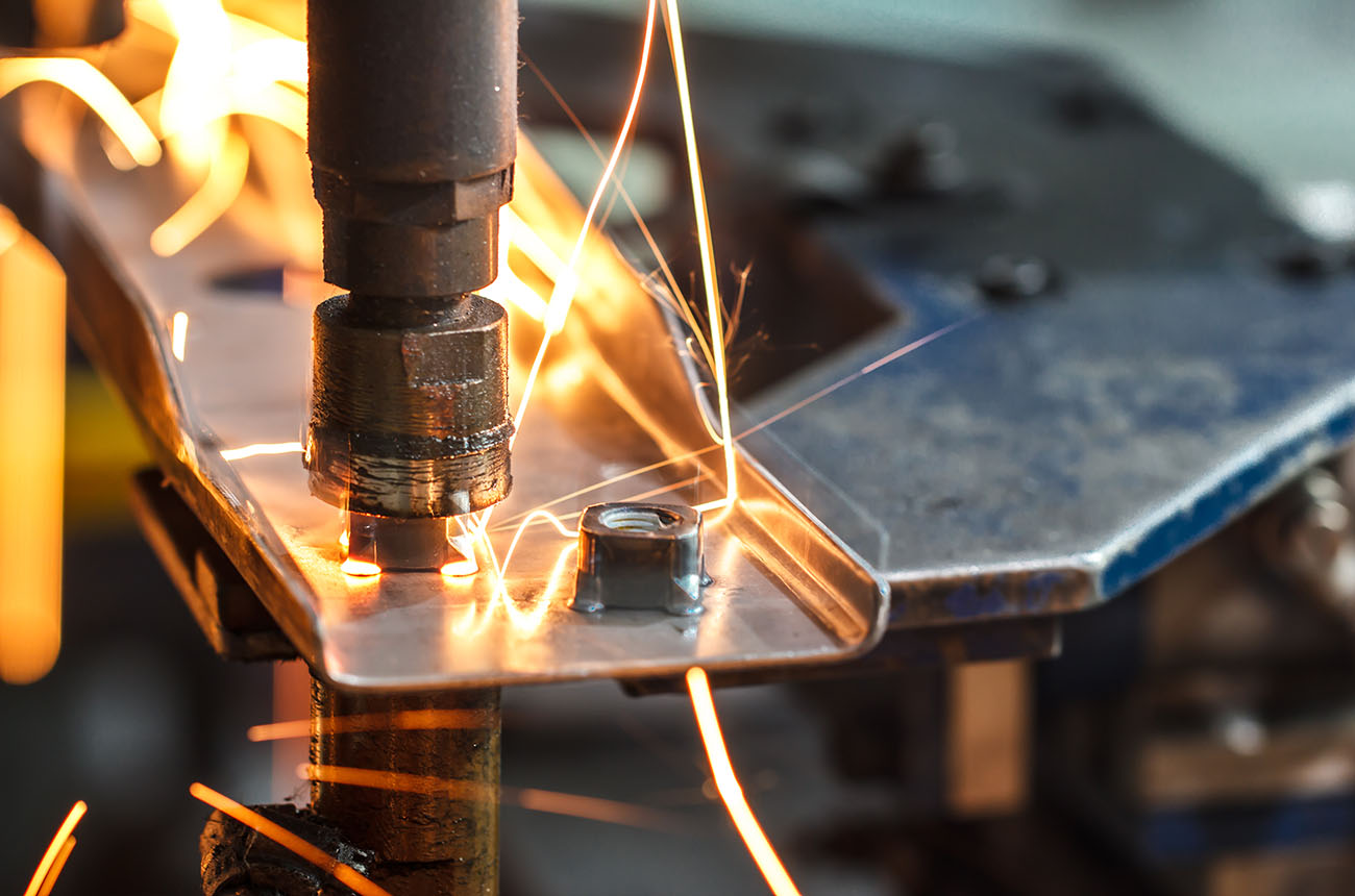 sparks bouncing off metal during welding